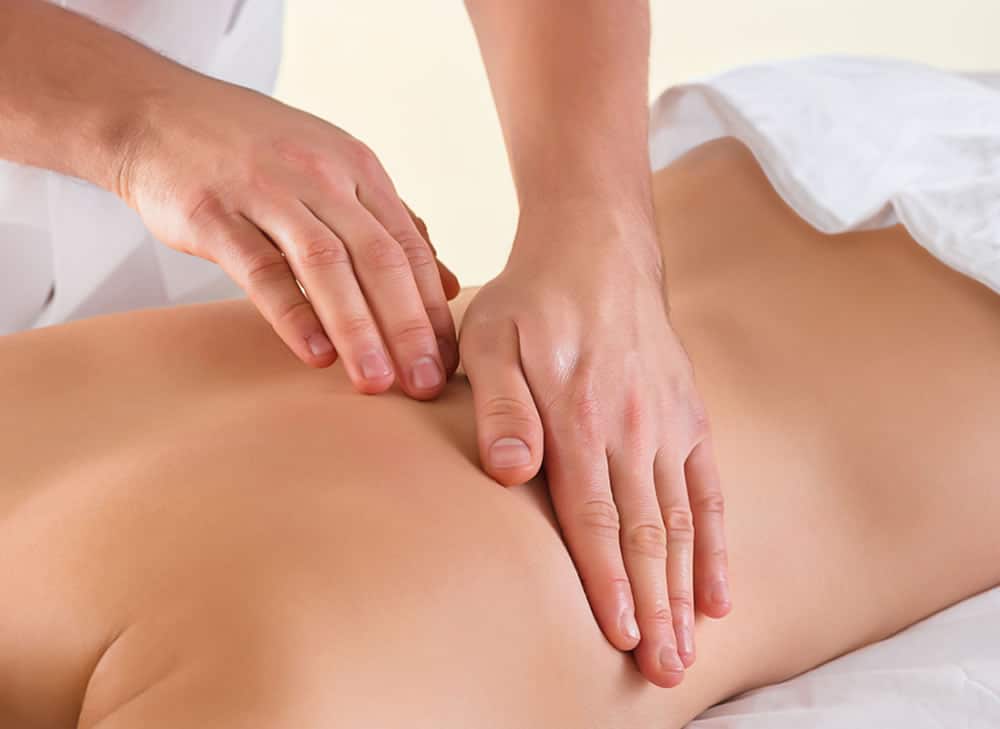 Sports massage being carried out on a female client